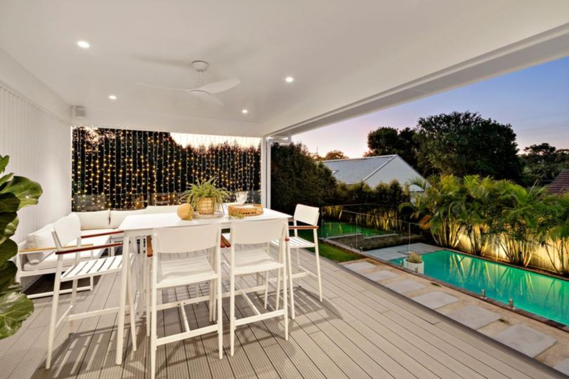 The home boasts a pool and outdoor entertainment area.