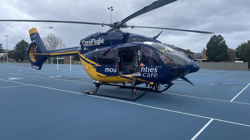 A man in his 50s was transported by CareFlight to Royal North Shore Hospital after being caught in powerlines while kitesurfing.