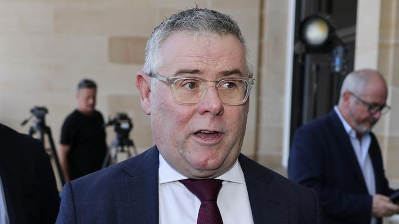 Senator Murray Watt pictured arriving at Parliament House.