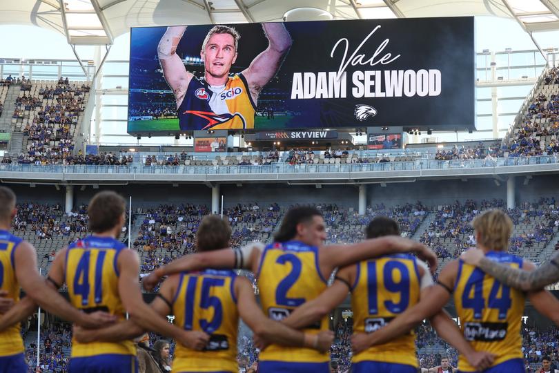 Eagles players pay tribute to Adam Selwood on Sunday.