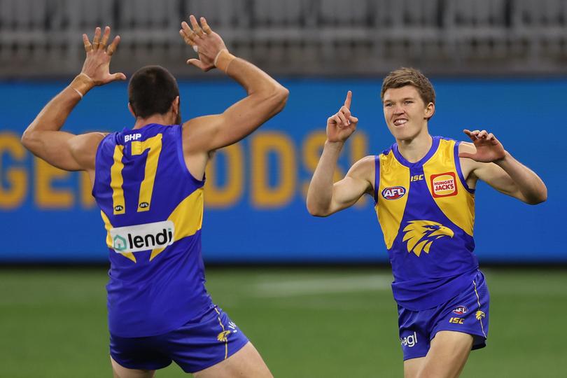 Brayden Ainsworth (right) moved into the mental health space following a challenging end to his AFL career.