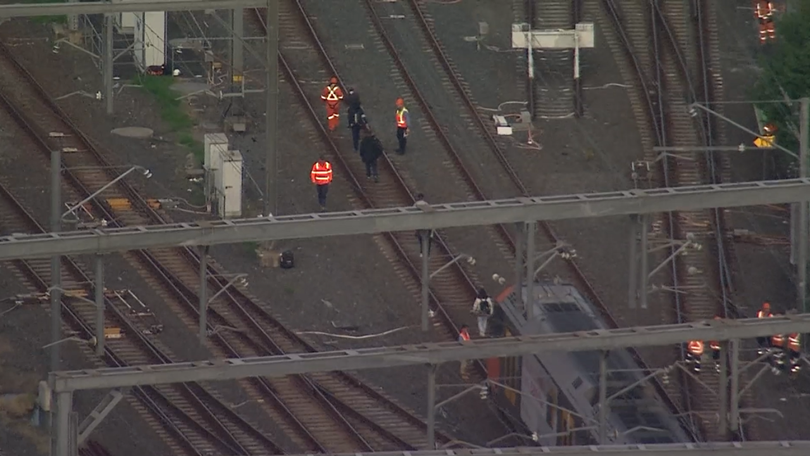 Passengers were evacuated from a train stranded on the tracks.