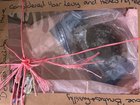 A vacuum-sealed cow dung package, wrapped in pink twine, was left at Premier Jacinta Allan's office.