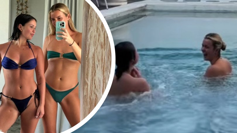 The 24-year-old had set up her phone to capture their swim but as they splash around in the rectangular pool they notice an unexpected guest off camera.
