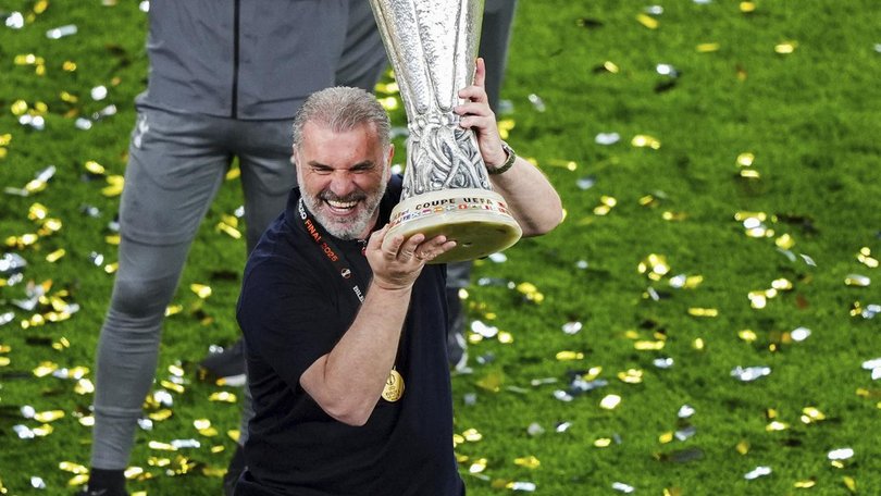 Spurs boss Ange Postecoglou lifts the Europa League trophy after they downed Manchester United.
