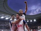 Brennan Johnson (C) gets hugged after the goal that won Ange Postecoglou's Spurs the Europa League. (AP PHOTO)