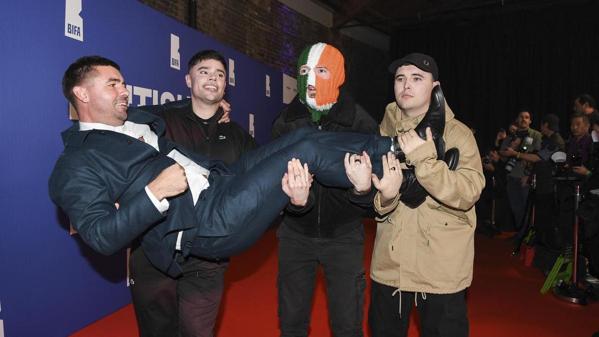Kneecap rapper charged with terror offence after concert outrage
