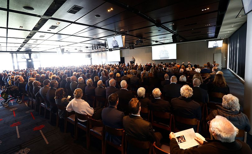 About 600 people attended the service.