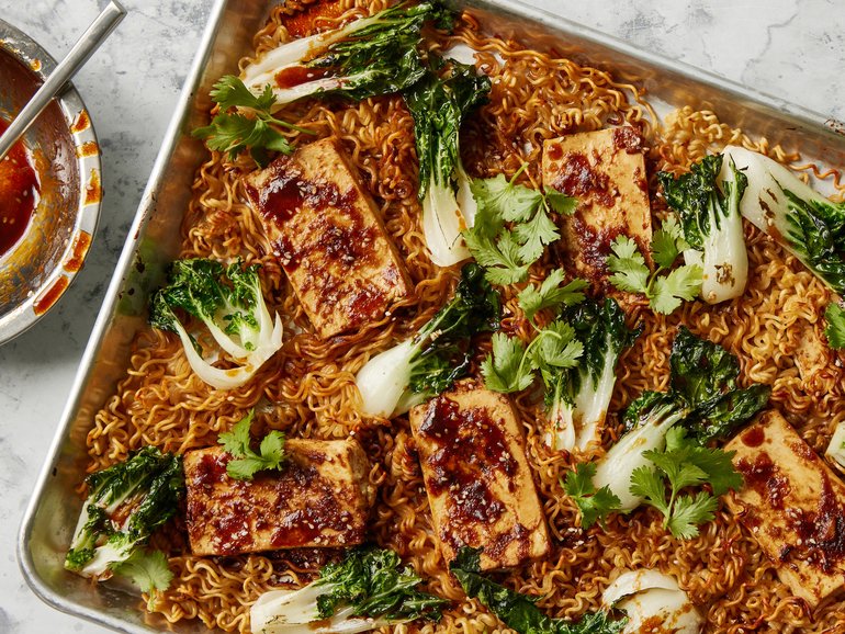 Crispy sheet-pan noodles with glazed tofu. Food styled by Barrett Washburne.  