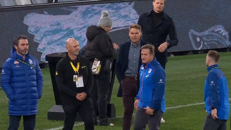 Kane Cornes and Luke Beveridge had words before the game.