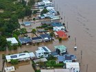 An aerial photo shows flooding at Settlement Point Road in Port Macquarie.