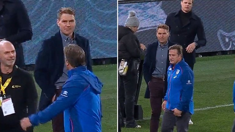 Kane Cornes and Luke Beveridge share words before Thursday night’s blockbuster.