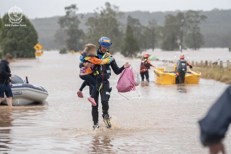 A supplied image of resue efforts being undertaken in Taree, NSW, Thursday, May 22, 2025. Days of intense rain have caused widespread flooding throughout the NSW mid-north coast. (AAP Image/Supplied by NSW Police) NO ARCHIVING, EDITORIAL USE ONLY