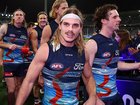 Bailey Smith walks off the field after the win over the Western Bulldogs. 