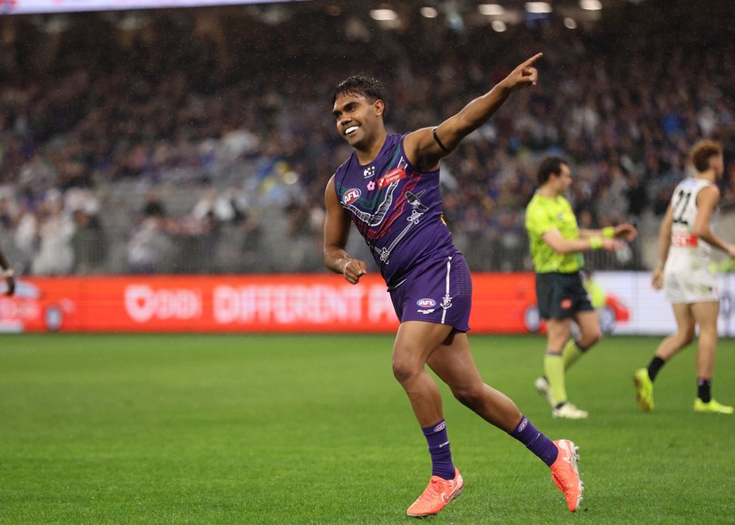 PERTH, AUSTRALIA - MAY 24: Isaiah Dudley of the Dockers celebrates a goal during the 2025 AFL Round 11 match between Walyalup (Fremantle Dockers) and Yartapuulti (Port Adelaide Power) at Optus Stadium on May 24, 2025 in Perth, Australia. (Photo by Janelle St Pierre/AFL Photos)