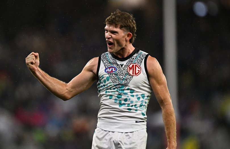 PERTH, AUSTRALIA - MAY 24: Mitch Georgiades of the Power celebrates a goal during the 2025 AFL Round 11 match between Walyalup (Fremantle Dockers) and Yartapuulti (Port Adelaide Power) at Optus Stadium on May 24, 2025 in Perth, Australia. (Photo by Daniel Carson/AFL Photos)