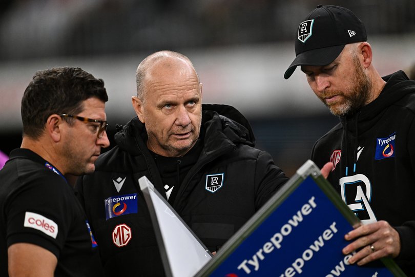 PERTH, AUSTRALIA - MAY 24: Ken Hinkley, Senior Coach of the Power addresses the players at the break during the 2025 AFL Round 11 match between Walyalup (Fremantle Dockers) and Yartapuulti (Port Adelaide Power) at Optus Stadium on May 24, 2025 in Perth, Australia. (Photo by Daniel Carson/AFL Photos)