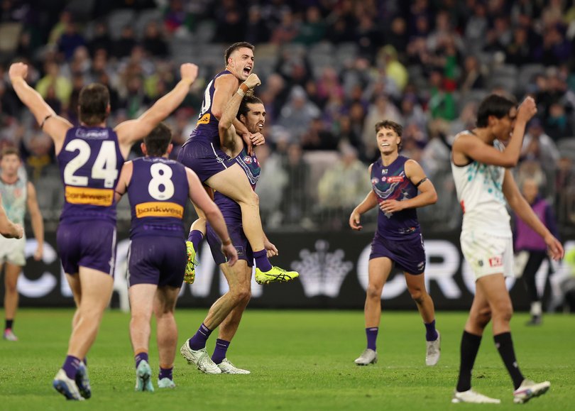 PERTH, AUSTRALIA - MAY 24: Alex Pearce of the Dockers celebrates a goal during the 2025 AFL Round 11 match between Walyalup (Fremantle Dockers) and Yartapuulti (Port Adelaide Power) at Optus Stadium on May 24, 2025 in Perth, Australia. (Photo by Janelle St Pierre/AFL Photos)