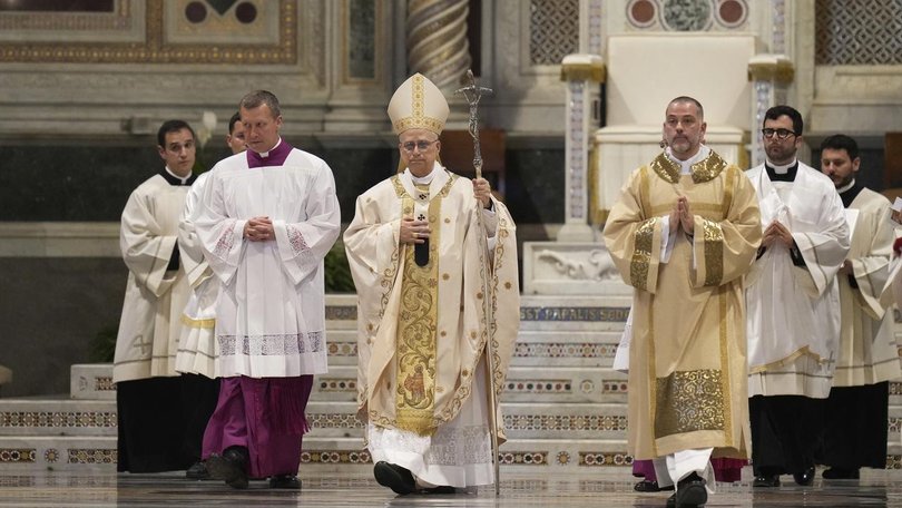 The first American pope formally took possession of two papal basilicas in the Eternal City.