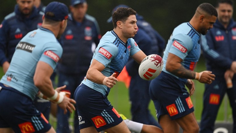 Mitchell Moses (centre) says he and Nathan Cleary can combine smoothly for the Blues. (Dean Lewins/AAP PHOTOS)