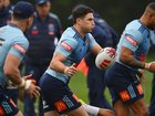Mitchell Moses (centre) says he and Nathan Cleary can combine smoothly for the Blues. (Dean Lewins/AAP PHOTOS)