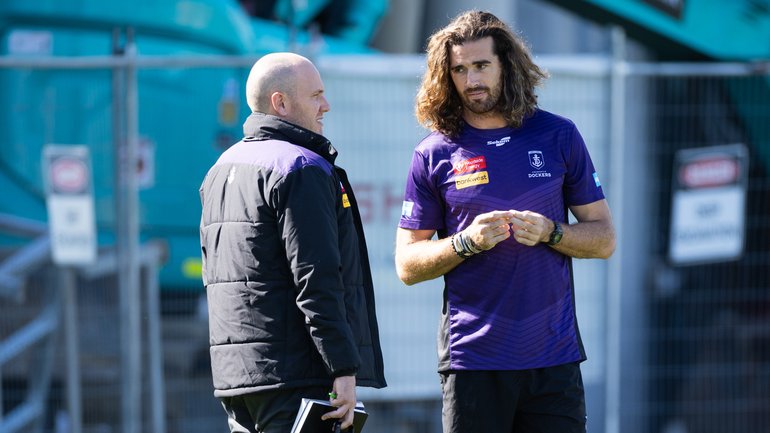 Alex Pearce chatting with Freo footy boss Joe Brierty on Monday.
