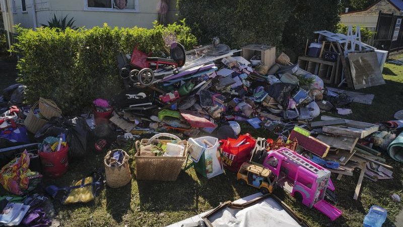 Police will "throw the book" at anyone found looting as NSW residents continue their flood recovery.