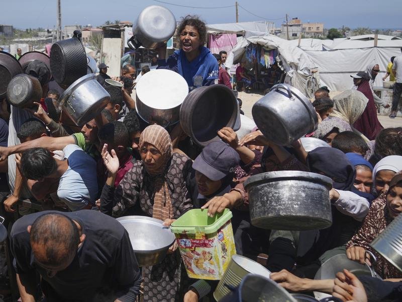 The Gaza Humanitarian Foundation has begun distributing food amid Israeli airstrikes. 