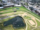 Australian Turf Club members rejected a plan to turn Rosehill Gardens into a housing development.