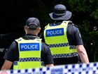 Schools and a hospital have been locked down as police hunt an armed gunman in Queensland. 
