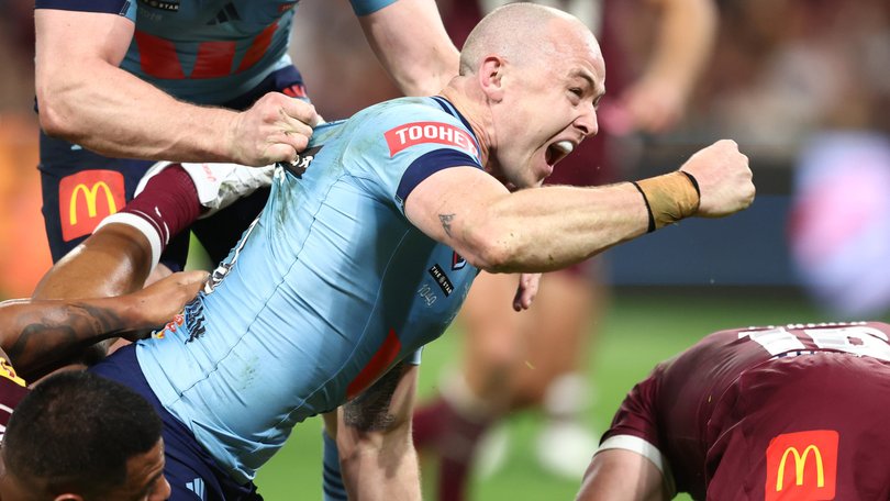 Dylan Edwards celebrates scoring the Blues’ last try.