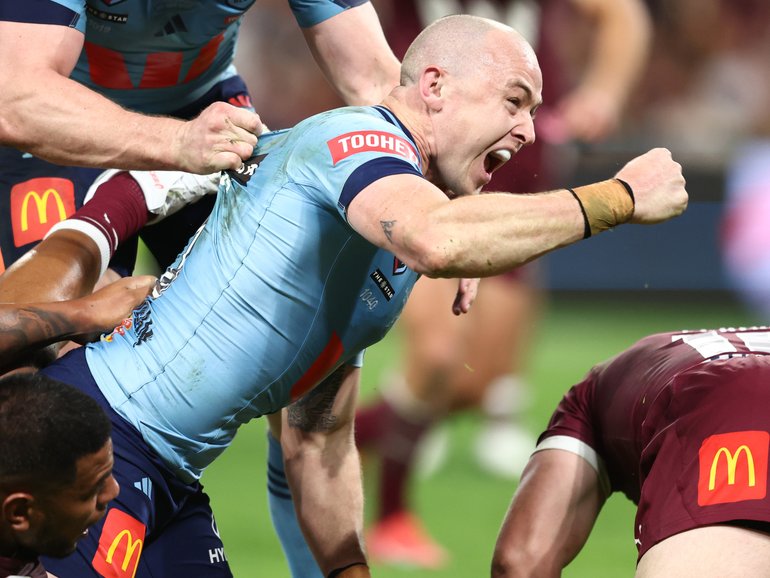 Dylan Edwards celebrates scoring the Blues’ last try.