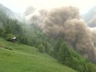 A huge chunk of a glacier in the Swiss Alps broke off on Wednesday, causing a deluge of rock, mud, and ice to bury a mountain village.