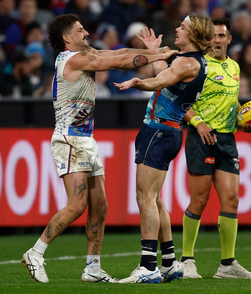 Tom Liberatore gets into it with Bailey Smith.