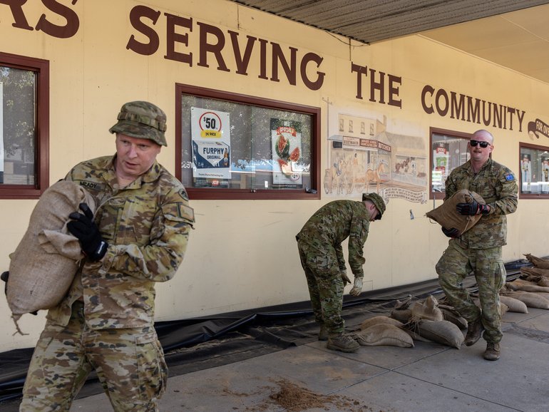 ADF personnel clean up after flooding in Rochester in 2004