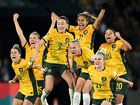 Australia players celebrate their World Cup quarterfinal over France in 2023.
