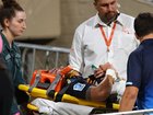 Noah Lolesio is stretchered from the field.
