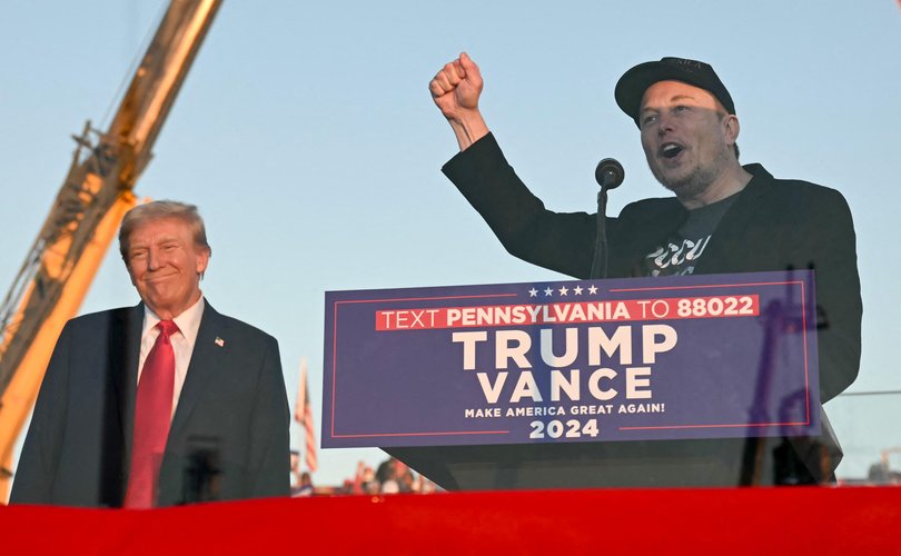 Elon Musk speaks on stage as he joins Donald Trump during a campaign rally at site of his first assassination attempt in Butler, Pennsylvania on October 5, 2024.