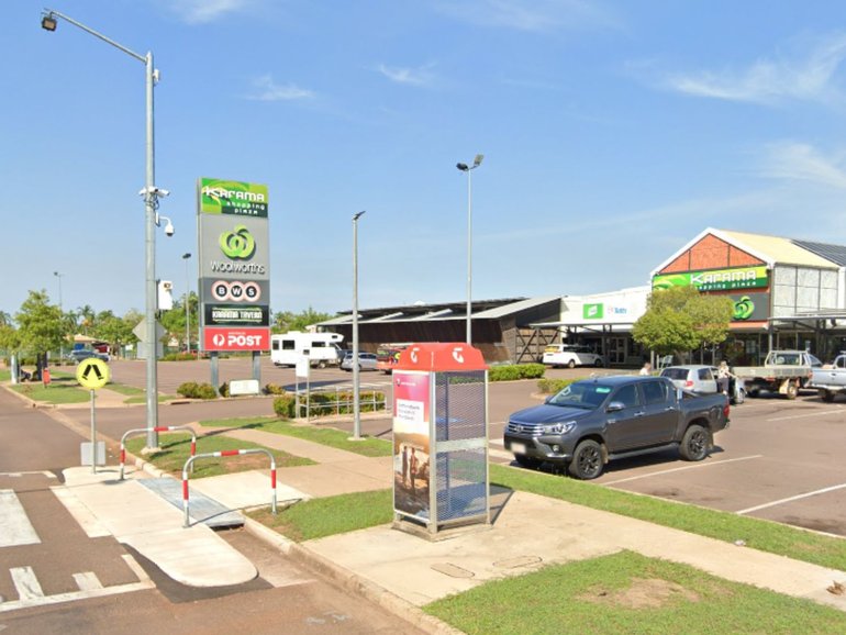 A woman laying unconscious outside a Karama shopping centre has allegedly been sexually assaulted on CCTV.