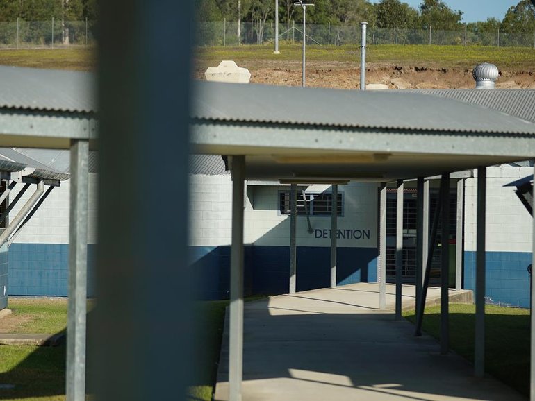 A woman accused of fatally stabbing her young child has been rushed from detention to hospital.