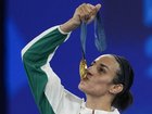 Imane Khelif kisses her medal after winning the women's 66 kg final at the 2024 Olympics.