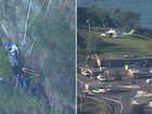 A paraglider in his 50s has been rescued after he crashed into a cliff face at Stanwell Tops and was stuck there for hours.