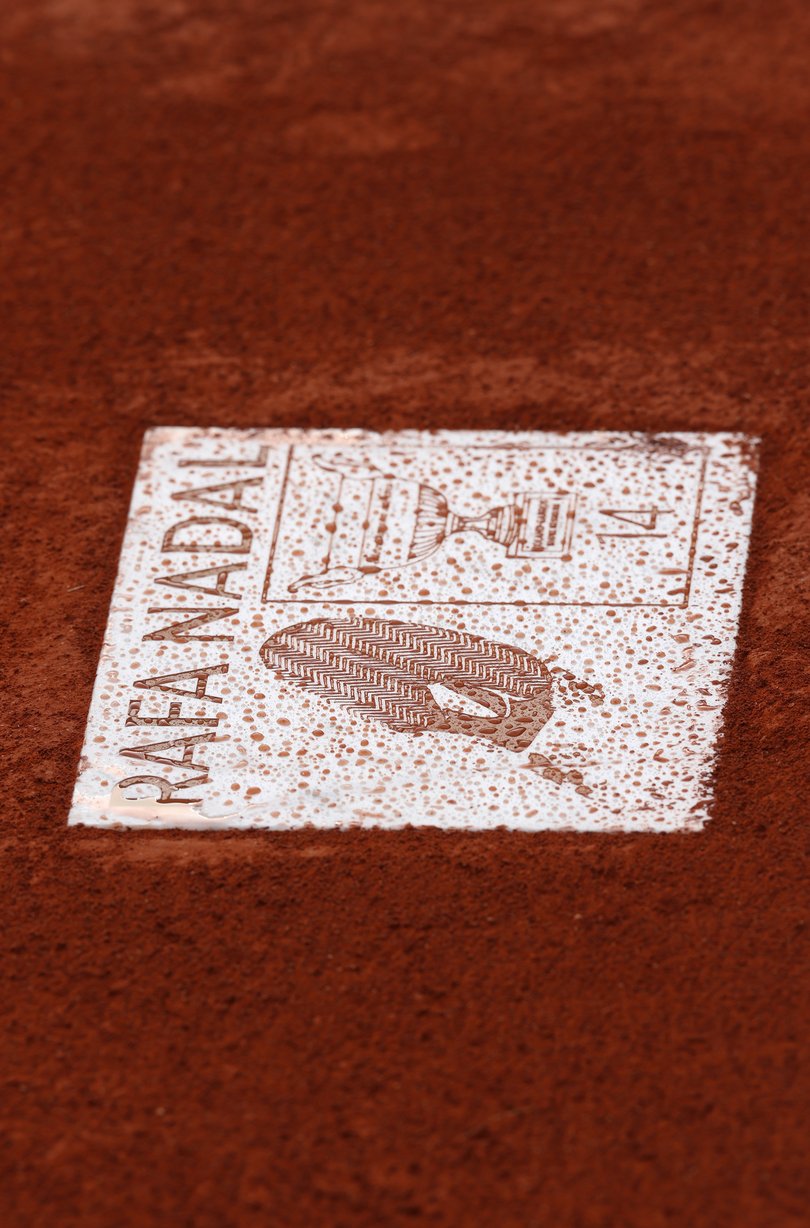 Detailed view of the on-court plaque dedicated to Rafael Nadal.