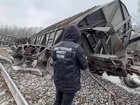 A passenger train has derailed in western Russia after a bridge collapsed, killing seven people. 