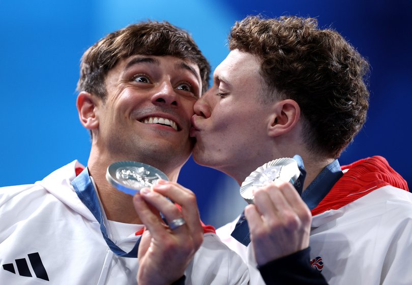 Silver medallists Tom Daley and Noah Williams of Team Great Britain celebrate after the Men’s Synchronised 10m Platform Final at the 2024 Pairs Olympics.