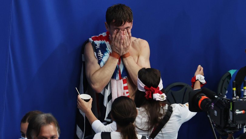 Tom Daley celebrates after winning gold in the Men's Synchronised 10m Platform Final at the Tokyo 2020 Olympic Games.