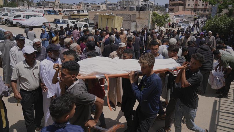 Palestinians have held funerals for people shot while heading to a Gaza aid hub for food.