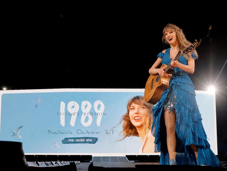 Taylor Swift announces the re-recording of her hit album 1989 during the Eras Tour.