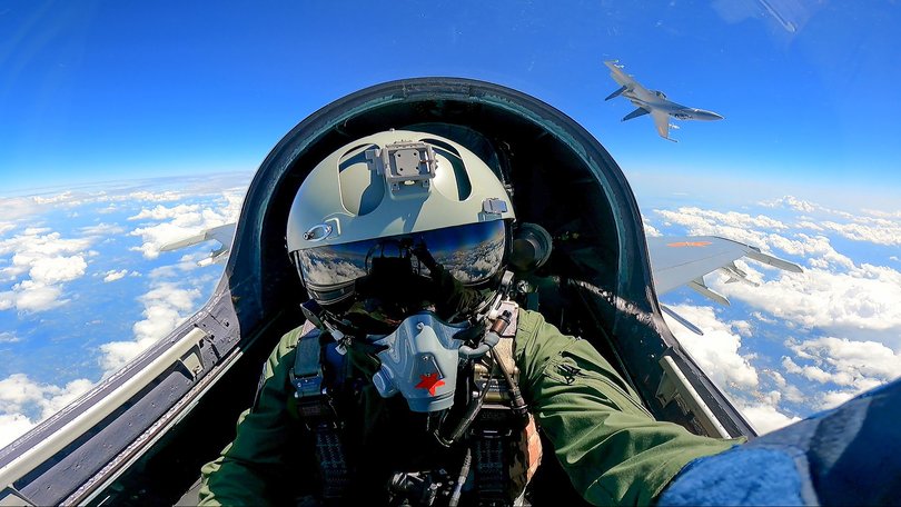 A Chinese fighter jet pilot takes part in combat readiness patrol and military exercises around Taiwan in 2023.
