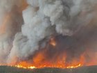 Thousands of Canadians have been evacuated as dozens of wildfires tear through forests (AP PHOTO)